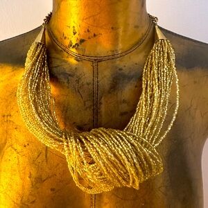Guncha statement necklace knotty gold beaded
